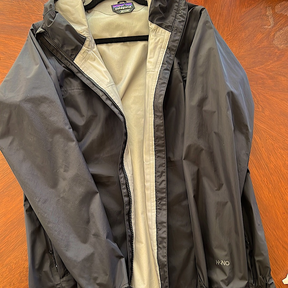 Patagonia Torrentshell size Large. I bought last year and it doesn’t fit